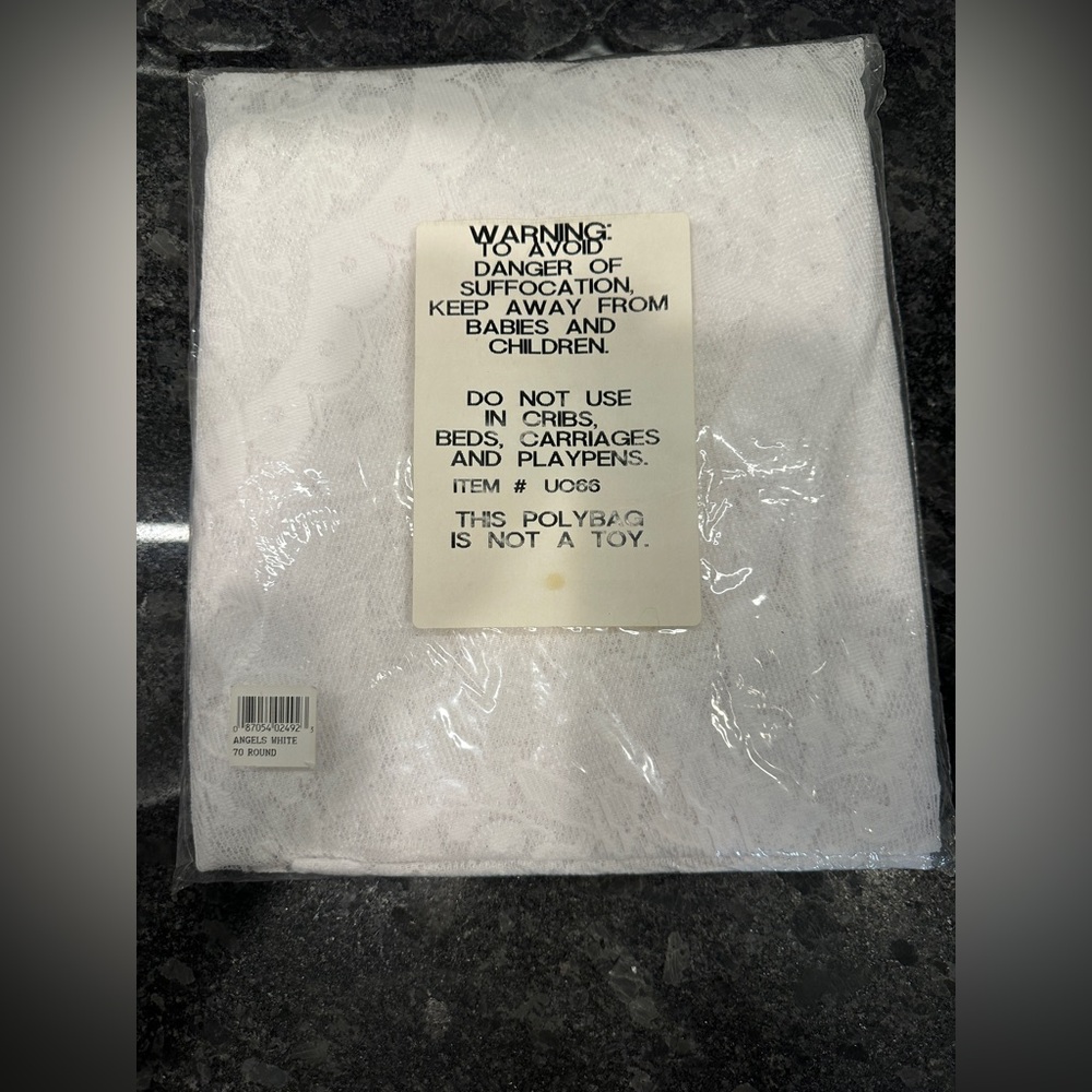 Vintage sealed never used 70” round lace slow scallop edged tablecloth roses